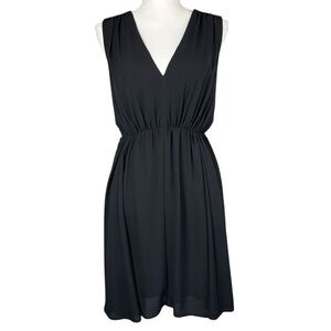 Express Black Mini Dress with cutout back exposed zipper Size 8 V Neck Lined